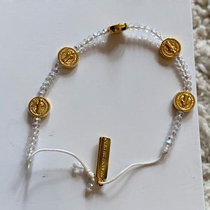 Crystal bead bracelet with gold tones